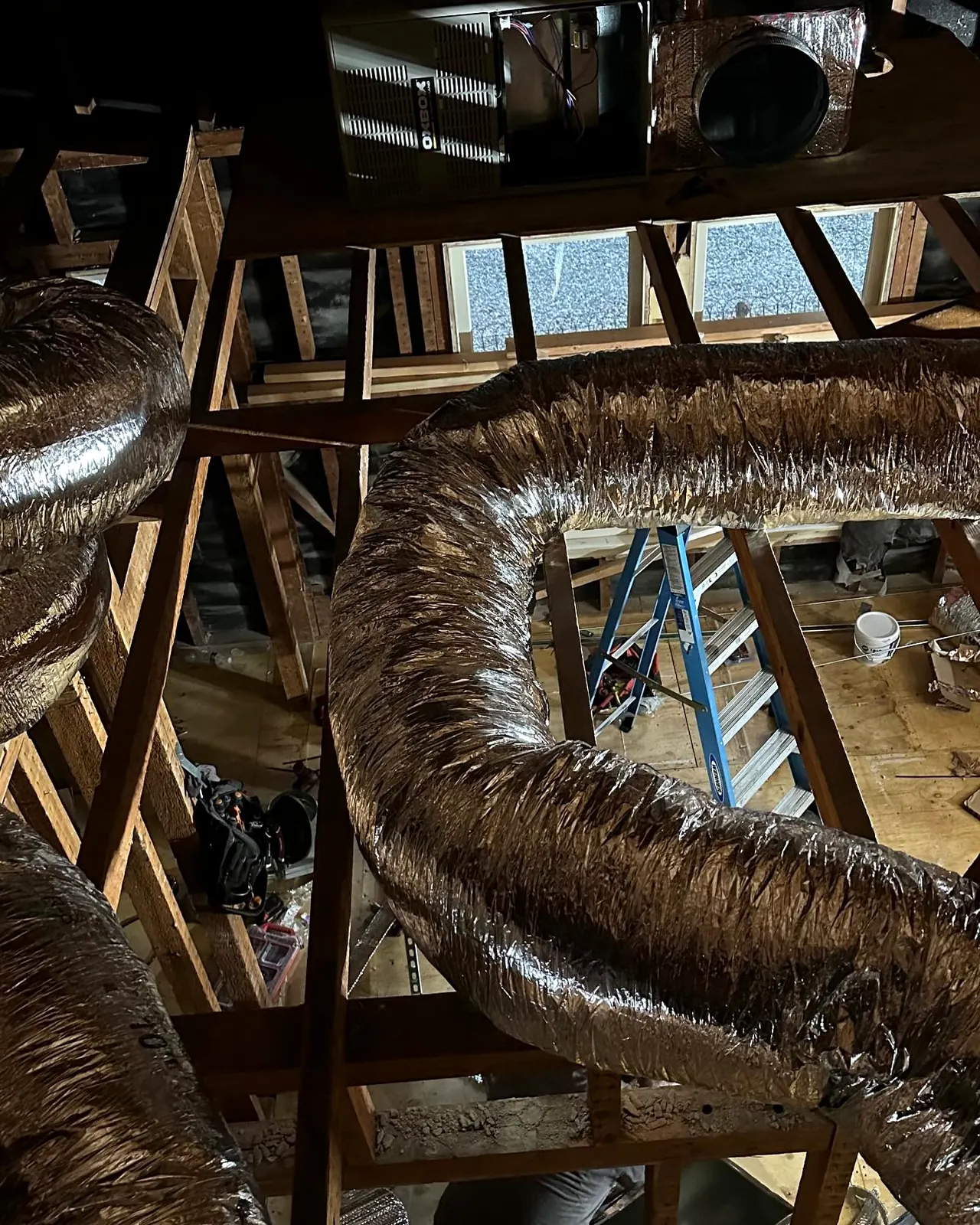 Flexible ductwork inside a building ceiling cavity