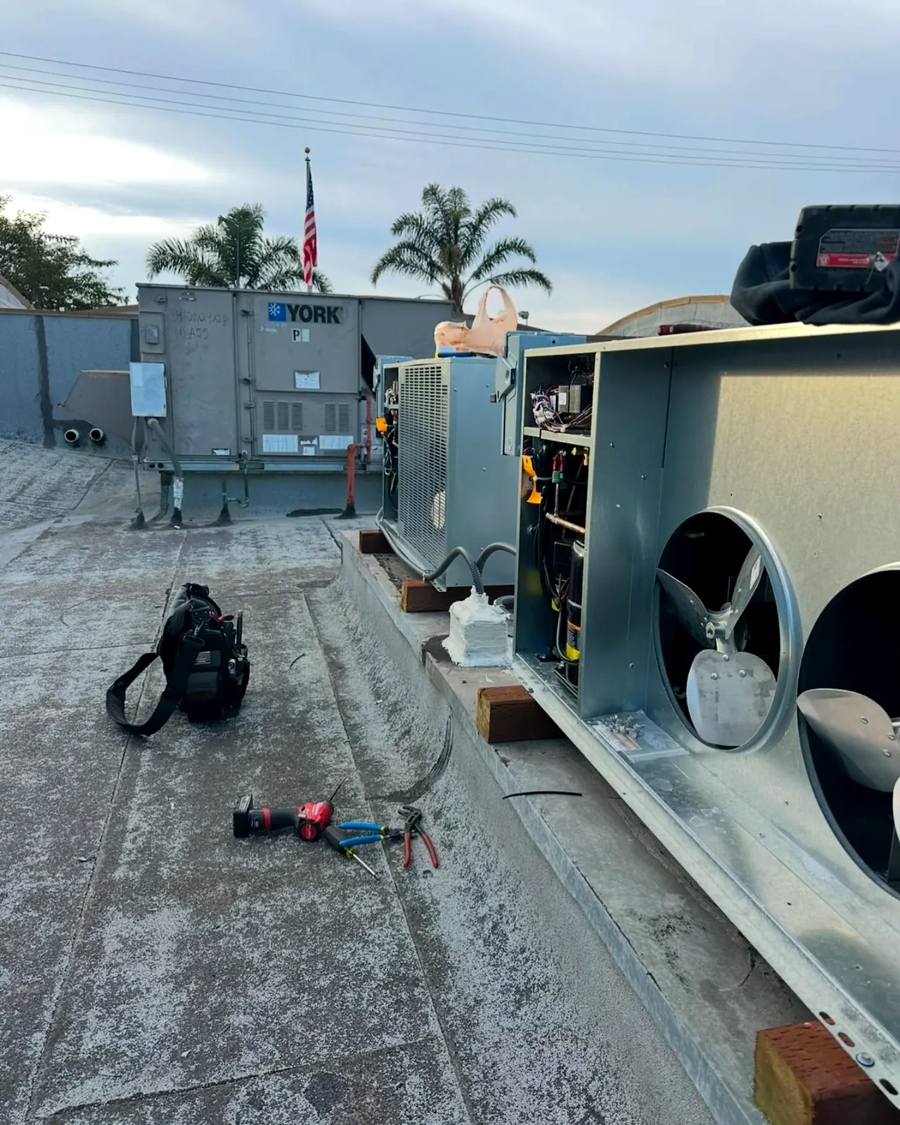 Commercial rooftop HVAC units opened for service